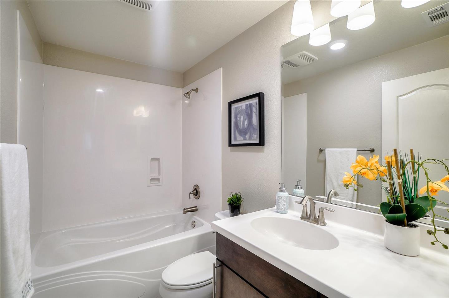 1646 Hittell Place San Jose, CA 95133 - Photo 20 of 21 a bathroom with a bathtub a sink and a mirror