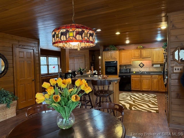8000 South County Line Road Henryville, IN 47126 - Photo 9 of 28 Chandelier to be replaced - dining open to kitchen and living room