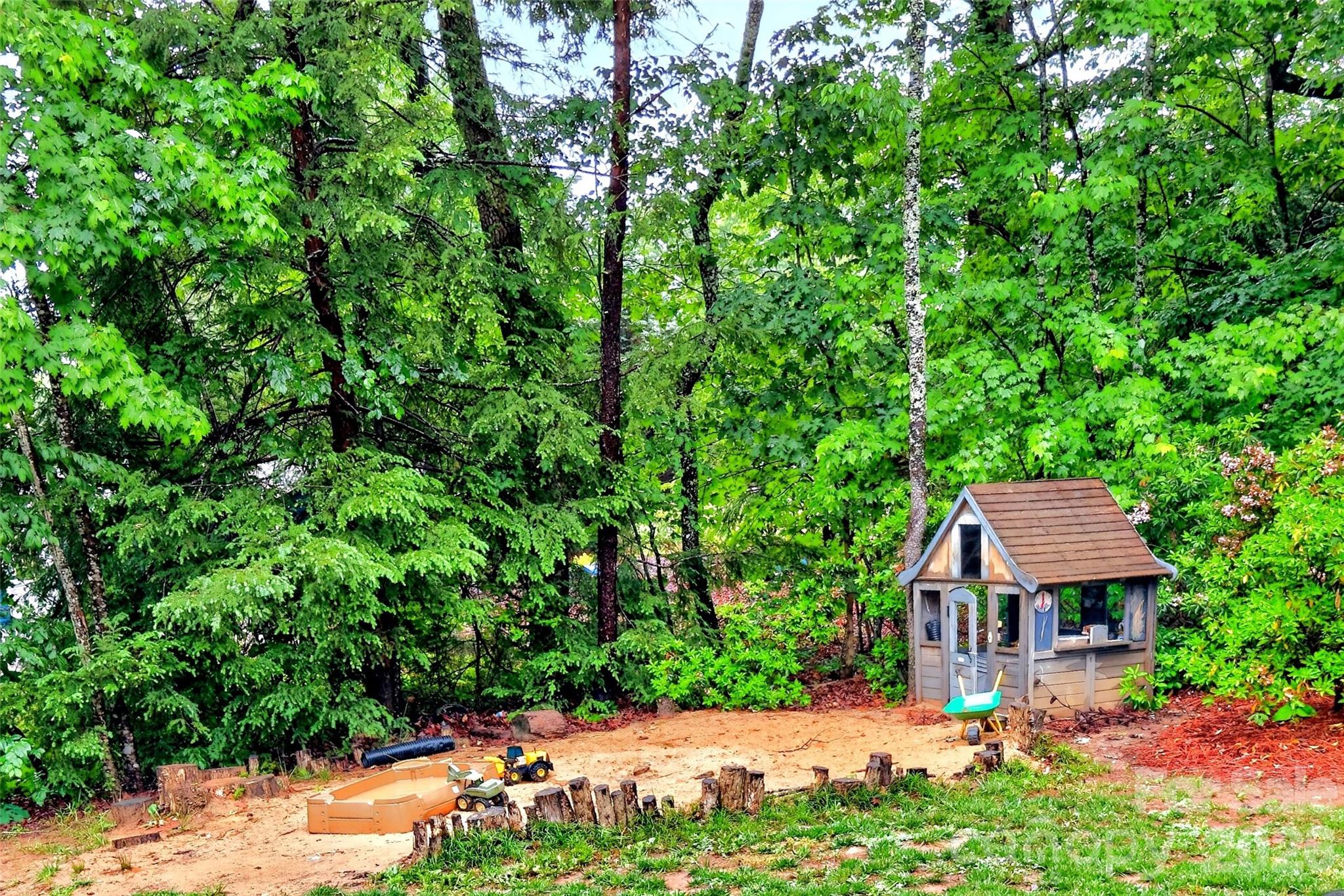 132 Maple Ridge Drive Old Fort, NC 28762 - Photo 39 of 40 a house view with a garden space