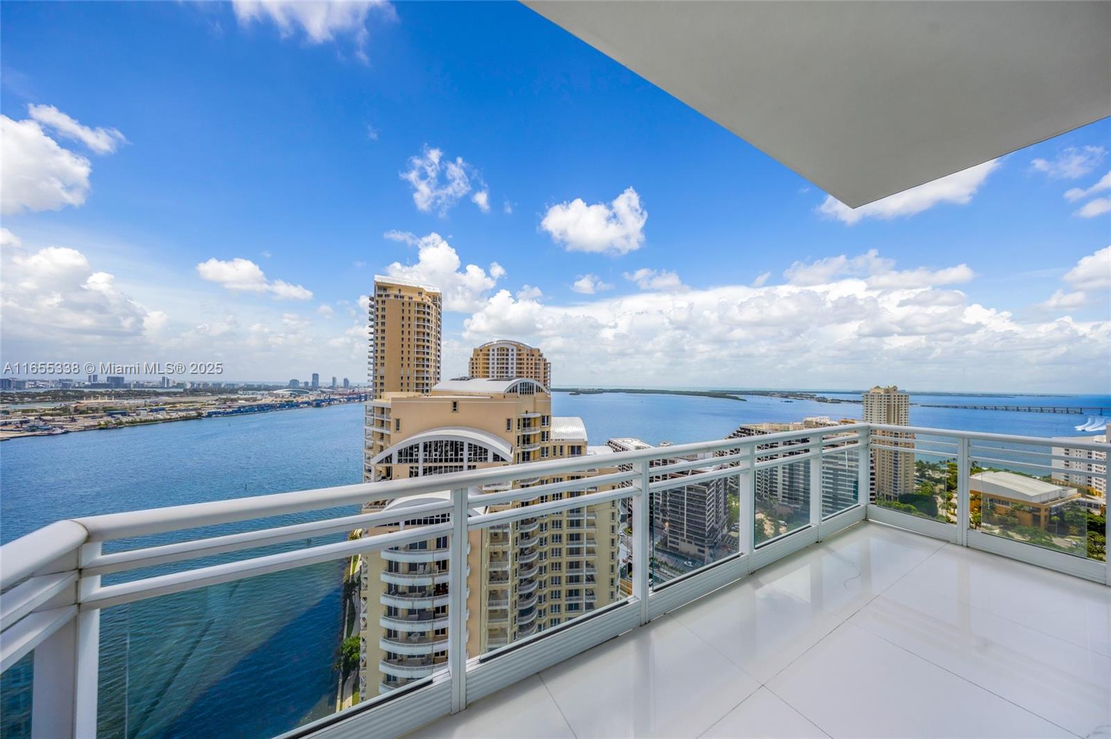 900 Brickell Key Boulevard, Unit 2603 Miami, FL 33131 - Photo 15 of 99 a view of a balcony with city view