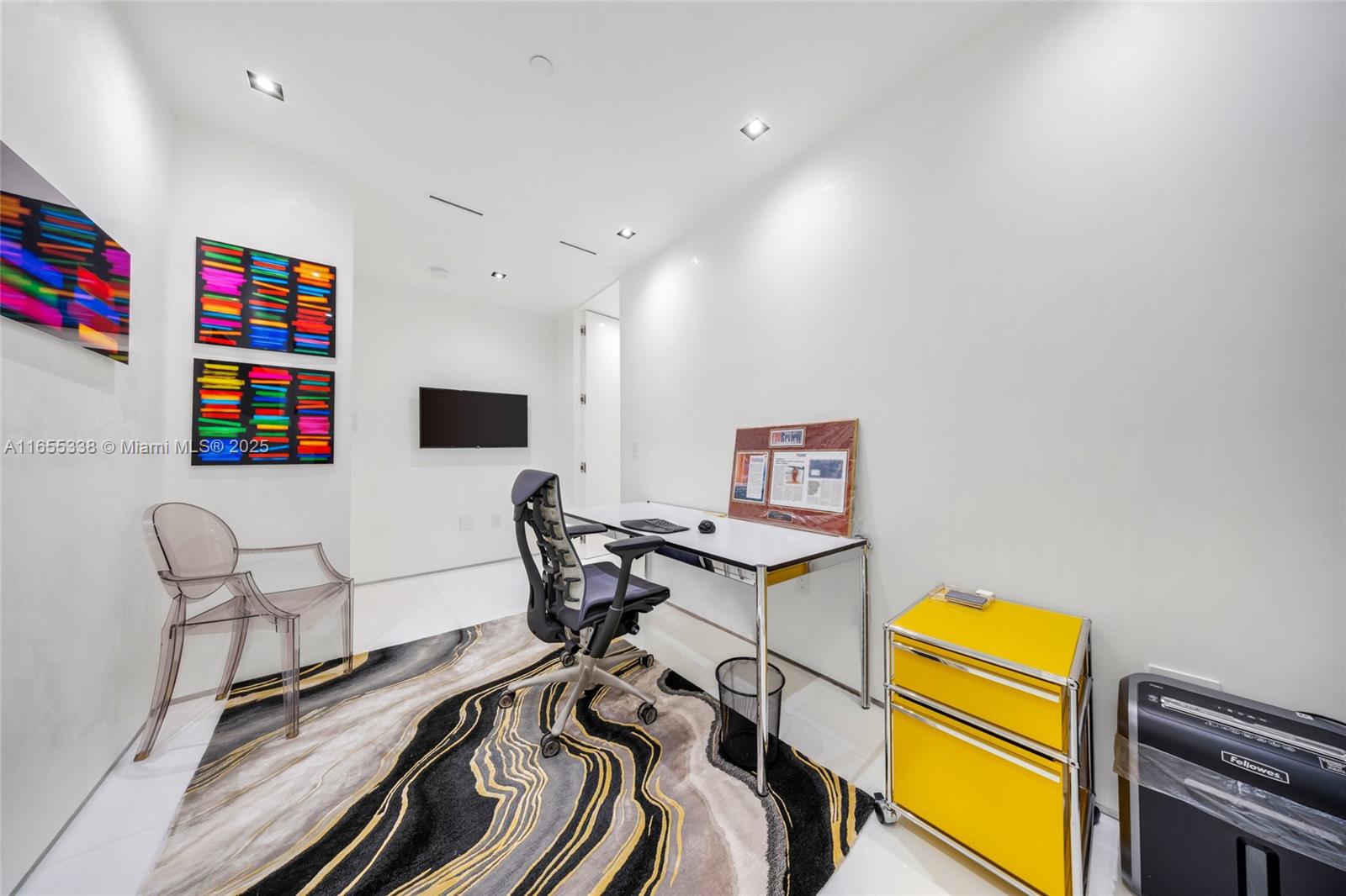 900 Brickell Key Boulevard, Unit 2603 Miami, FL 33131 - Photo 75 of 99 a workspace with furniture and a wooden floor