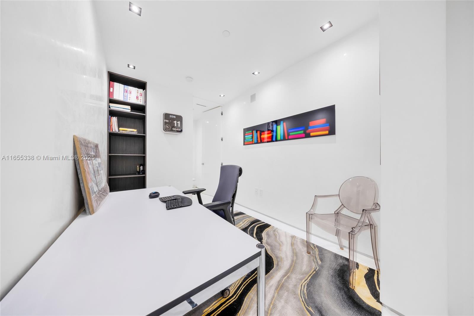 900 Brickell Key Boulevard, Unit 2603 Miami, FL 33131 - Photo 76 of 99 a bedroom with a bed and a chair