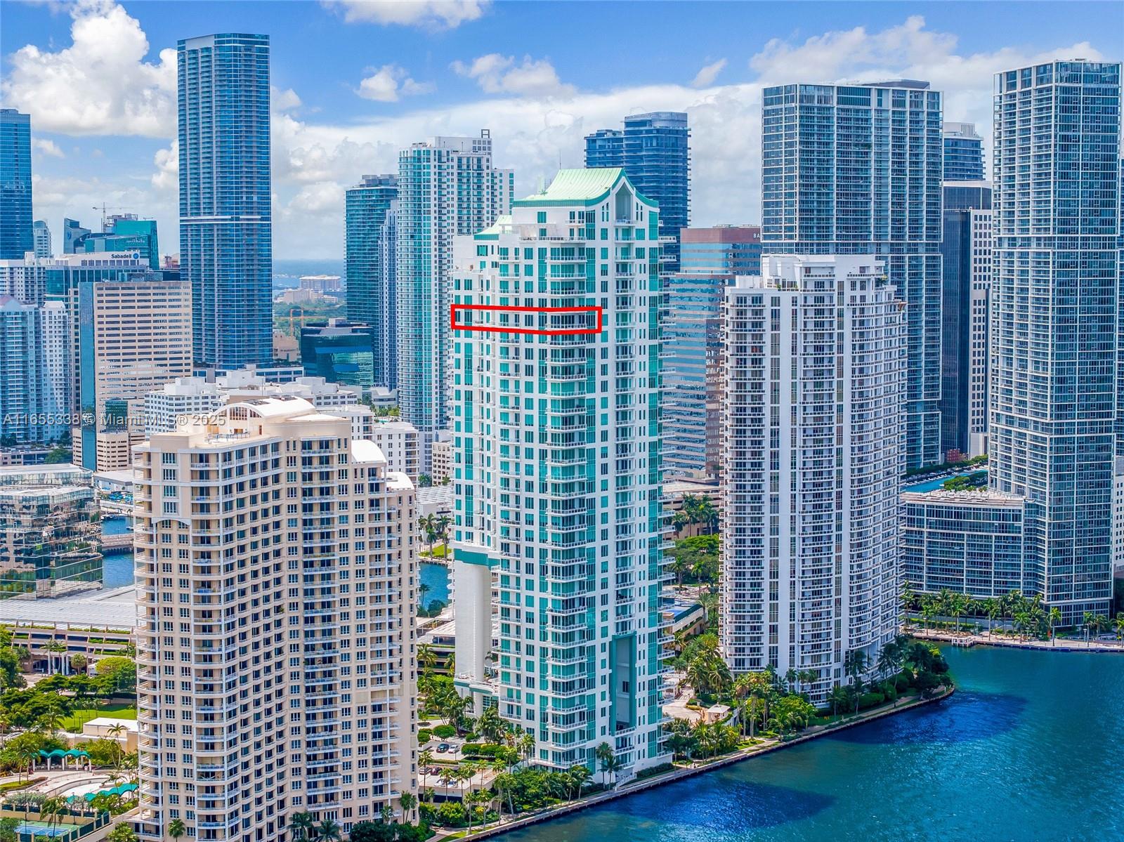 900 Brickell Key Boulevard, Unit 2603 Miami, FL 33131 - Photo 91 of 99 a view of a city with tall buildings