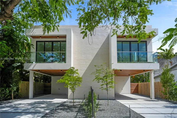 a house view with a garden space