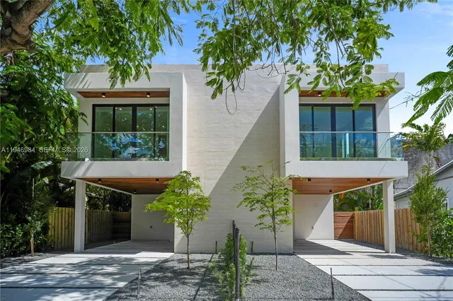 a house view with a garden space