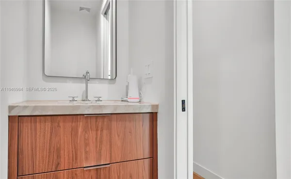 a view of a kitchen with a large window