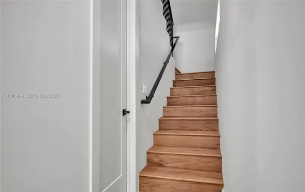 a view of a room with a large window