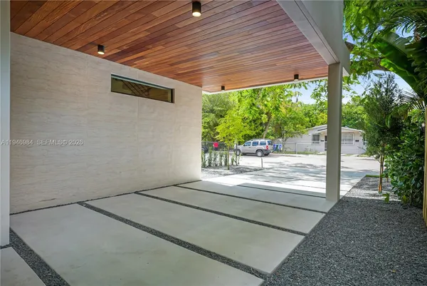 a view of backyard with green space