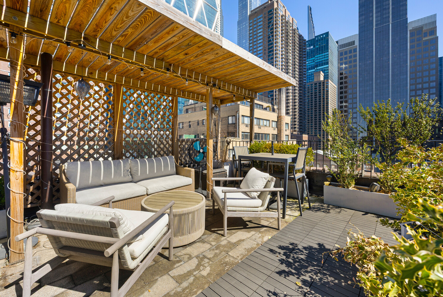 321 West 55th Street, Unit 93 Manhattan, NY 10019 - Photo 8 of 10 a building outdoor space with patio furniture