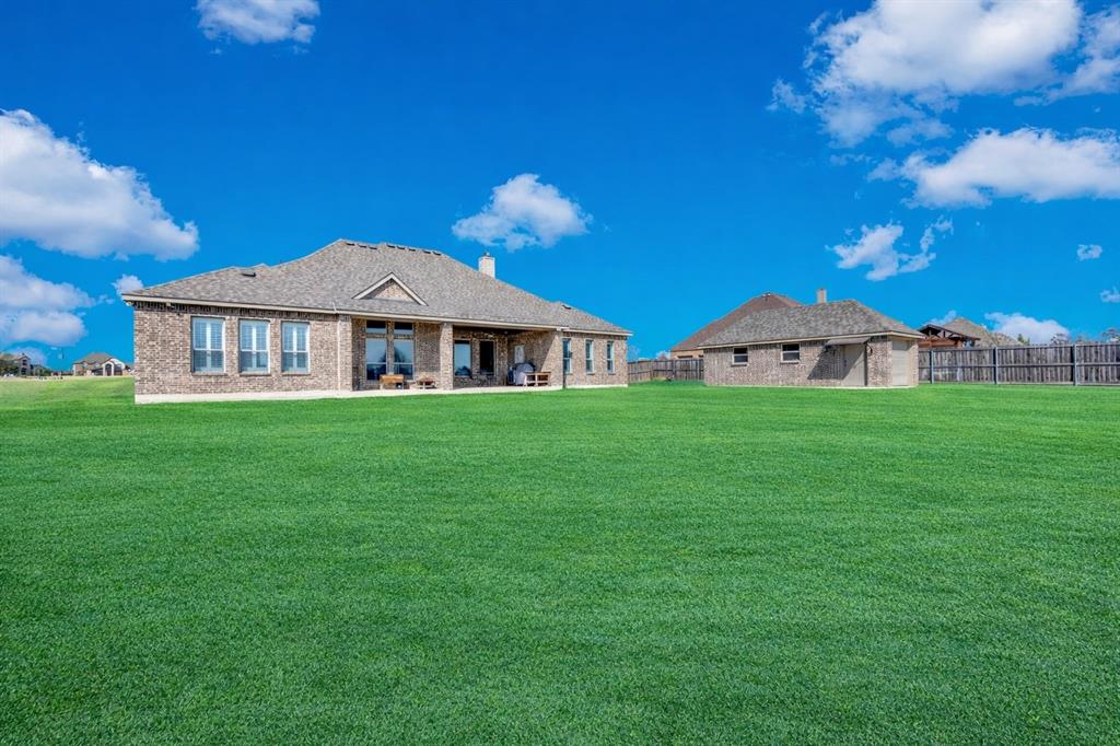 2650 Mc Alpin Road Midlothian, TX 76065 - Photo 33 of 36 Back yard looking at the home and outbuilding