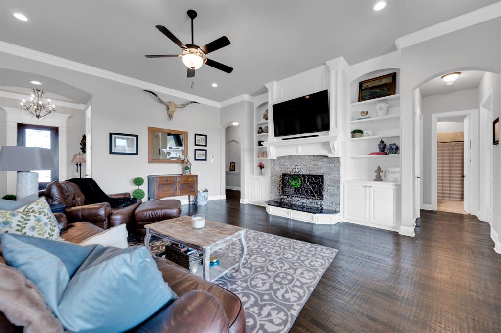 2650 Mc Alpin Road Midlothian, TX 76065 - Photo 9 of 36 Living room with picture of fireplace and build in bookshelves