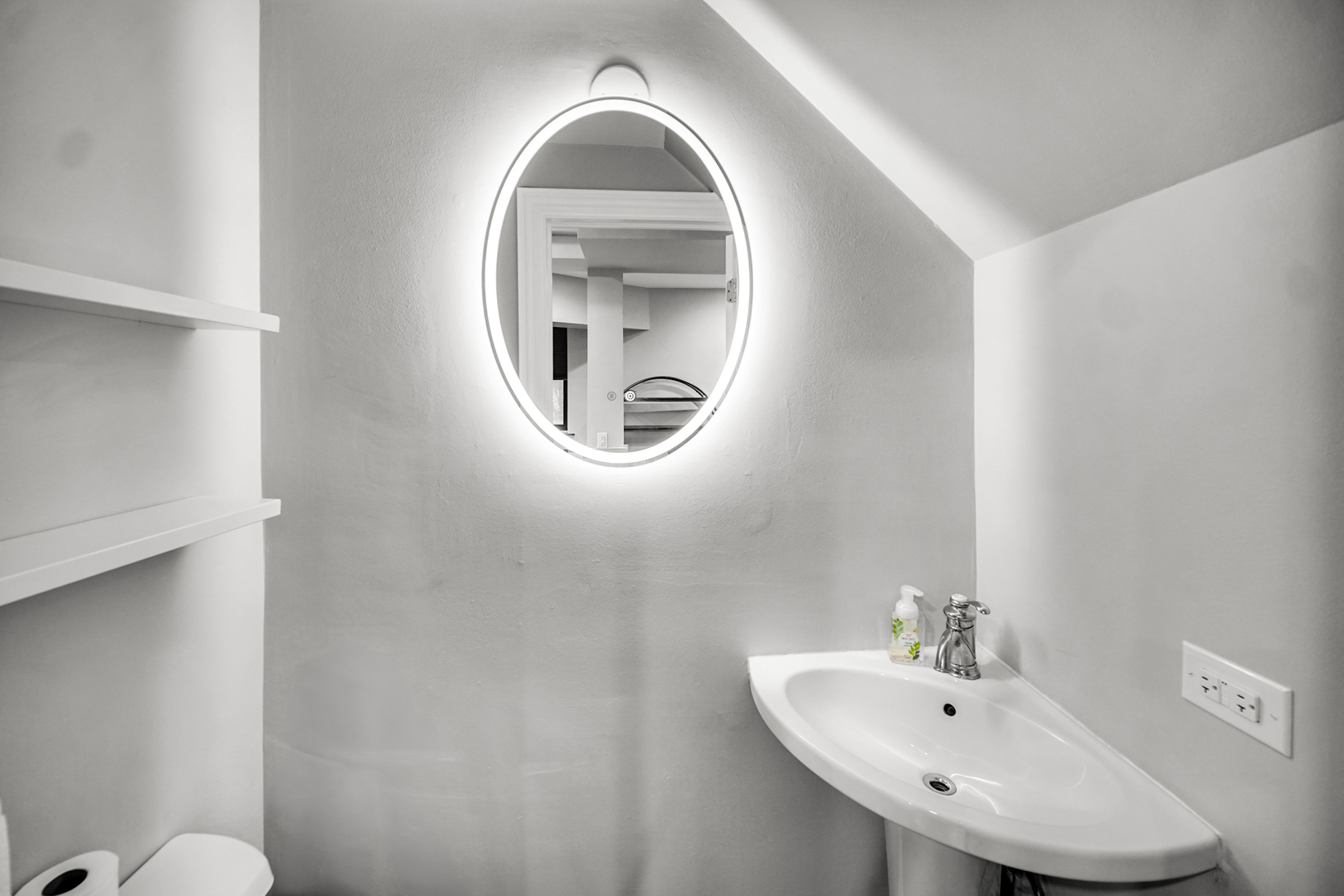 Undisclosed Address Chicago, IL 60615 - Photo 5 of 11 a bathroom with a sink and a mirror