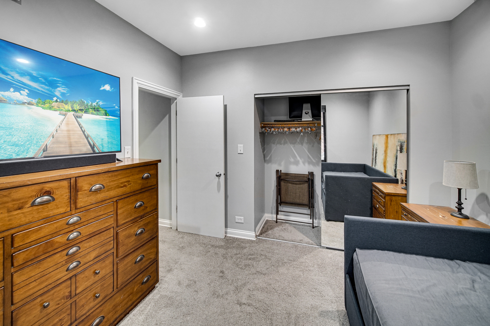 Undisclosed Address Chicago, IL 60615 - Photo 8 of 11 a living room with furniture and mirror