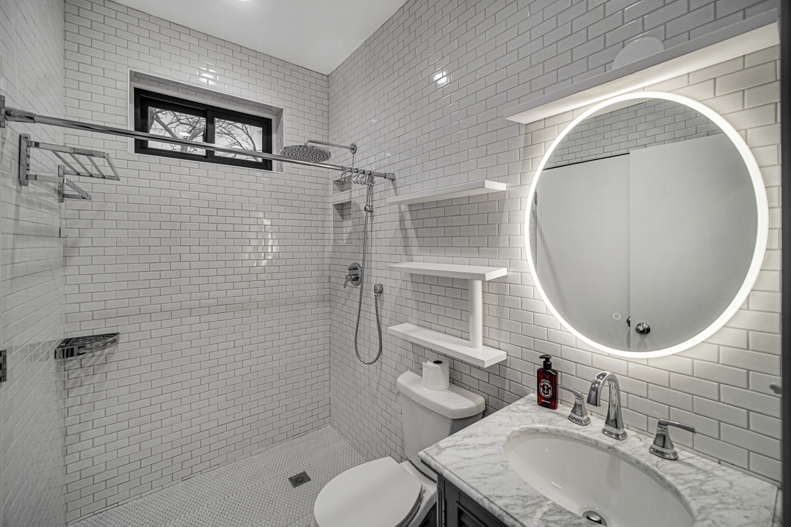 Undisclosed Address Chicago, IL 60615 - Photo 9 of 11 a bathroom with a sink mirror and toilet