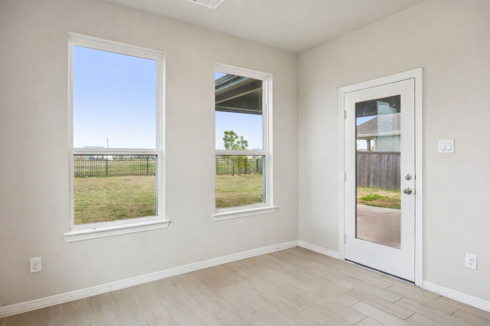 8103 Red Shiner Way Fulshear, TX 77441 - Photo 11 of 29 an empty room with windows
