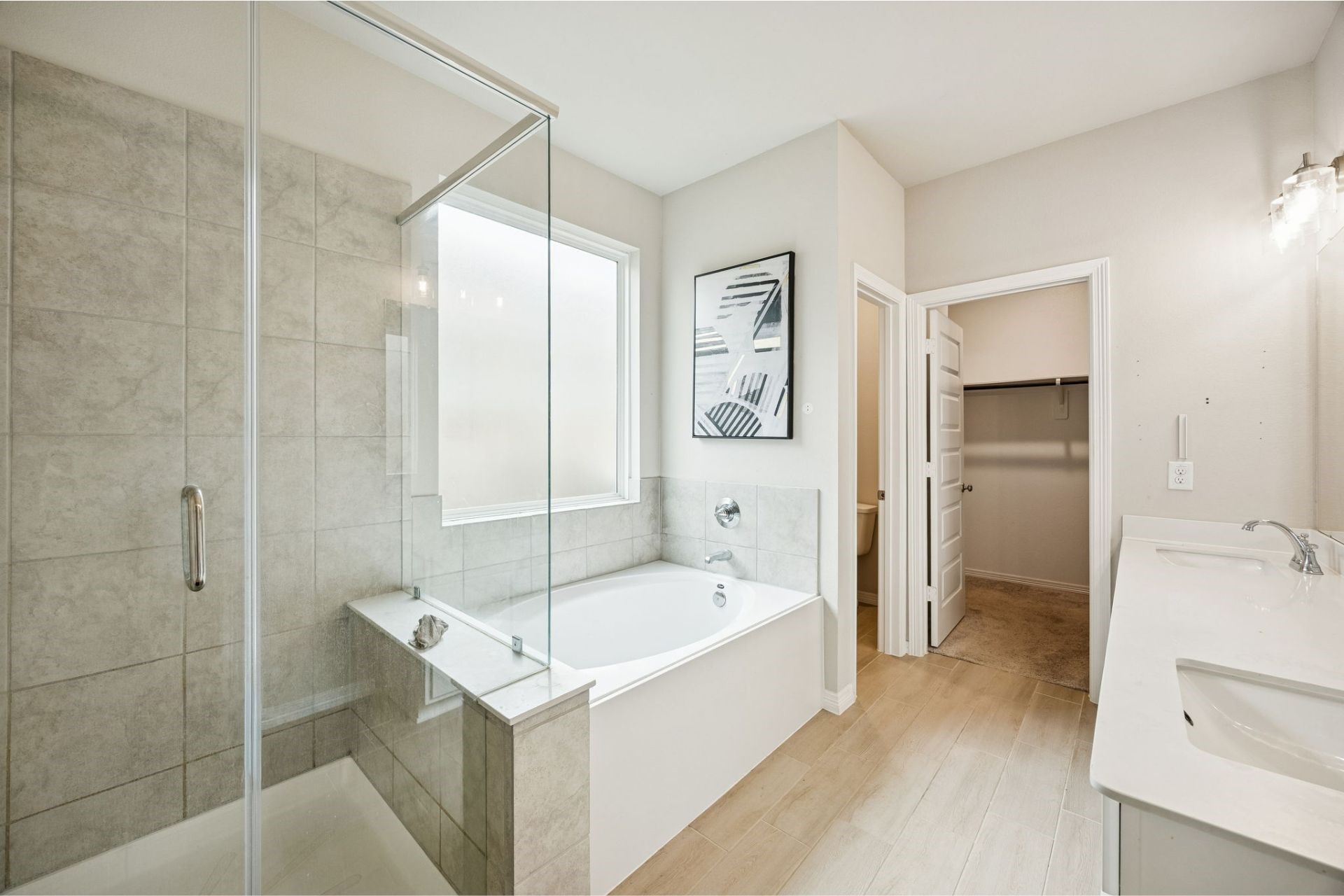 8103 Red Shiner Way Fulshear, TX 77441 - Photo 13 of 29 a bathroom with a bathtub and a sink