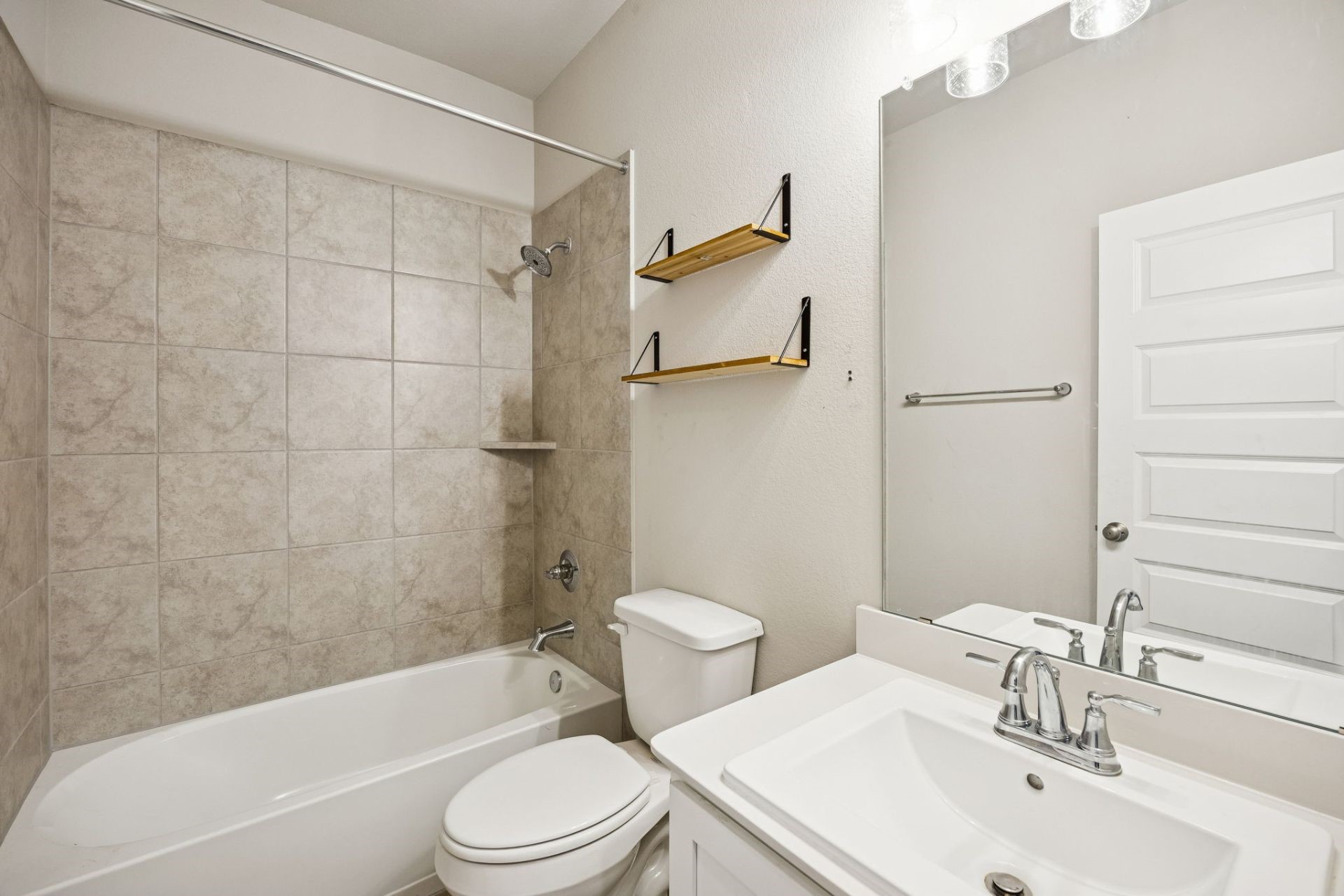 8103 Red Shiner Way Fulshear, TX 77441 - Photo 17 of 29 a bathroom with a sink toilet and shower