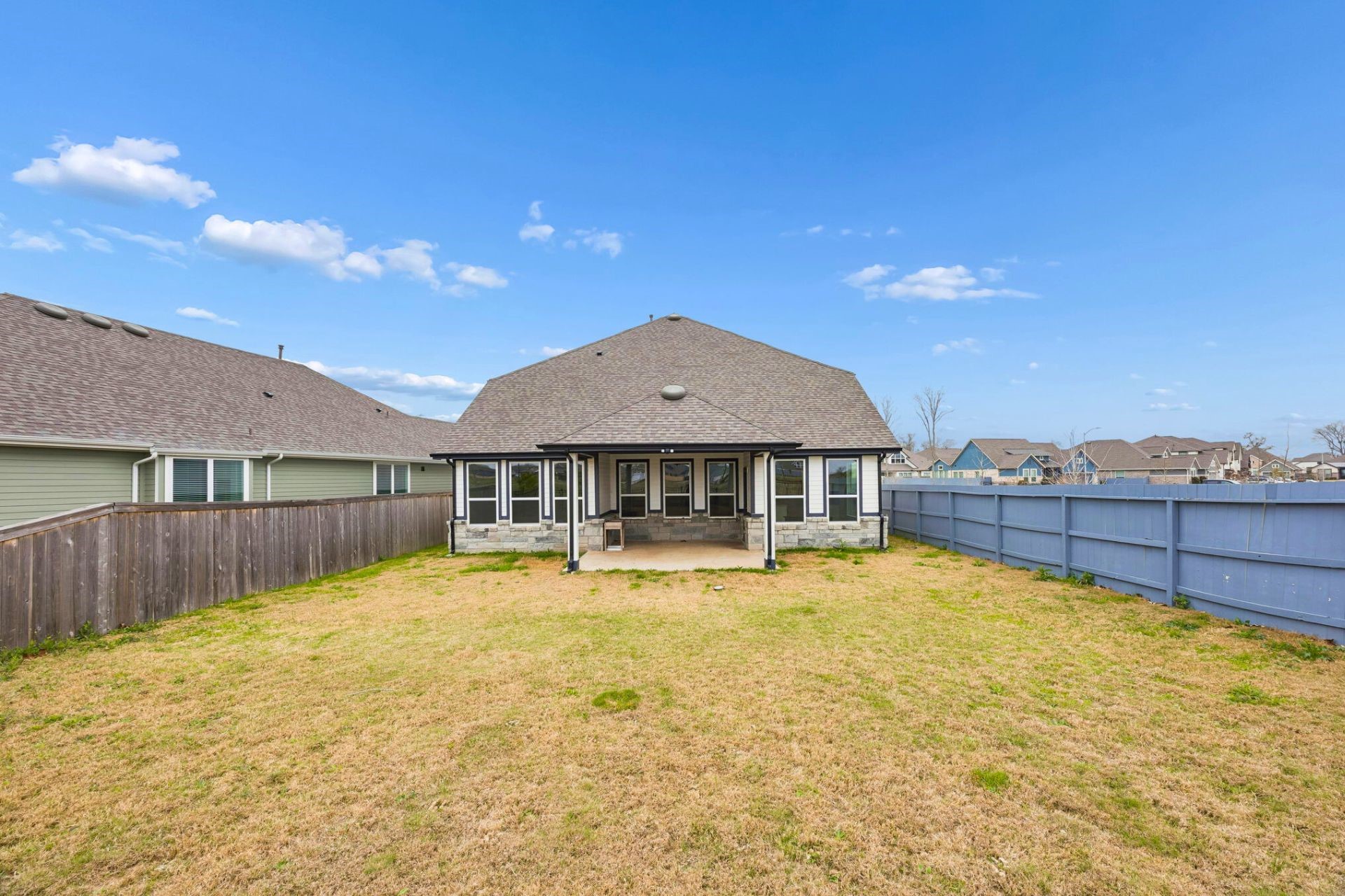 8103 Red Shiner Way Fulshear, TX 77441 - Photo 23 of 29 a view of a house with a yard