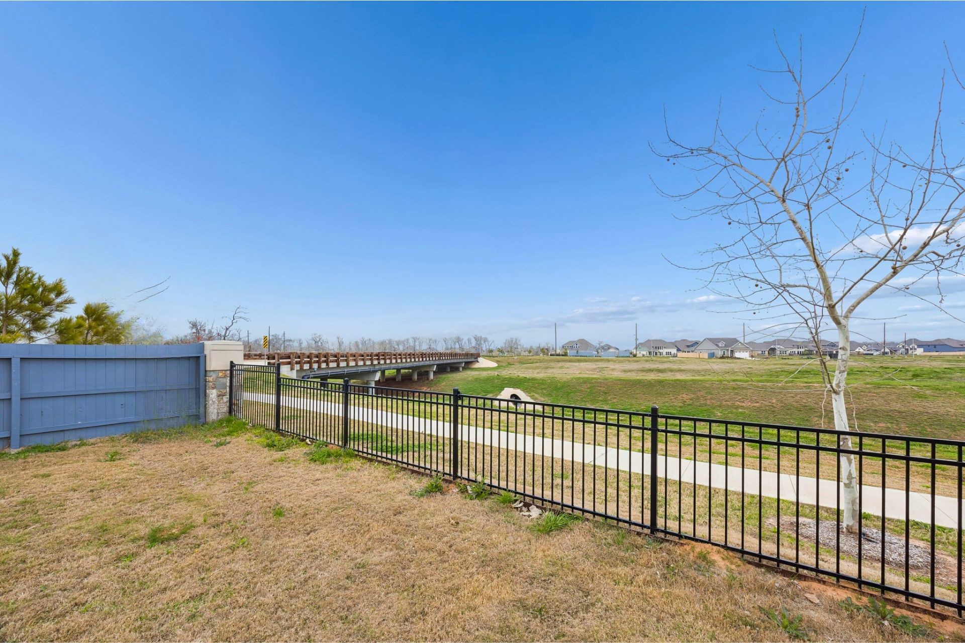 8103 Red Shiner Way Fulshear, TX 77441 - Photo 24 of 29 a view of a terrace with a bench