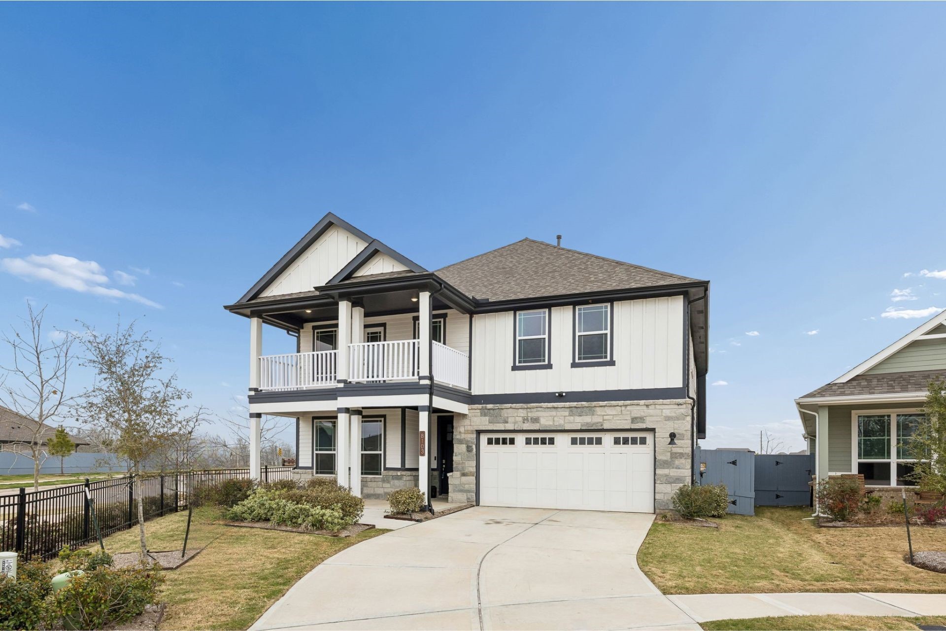 8103 Red Shiner Way Fulshear, TX 77441 - Photo 25 of 29 a front view of a house with a yard