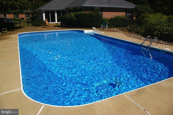 3100 Bennett Point Road Queenstown, MD 21658 - Photo 7 of 28 The pool adjoins the house