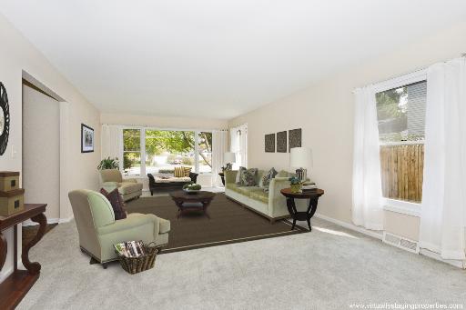 2427 Central Road Glenview, IL 60025 - Photo 2 of 14 a living room with furniture and window