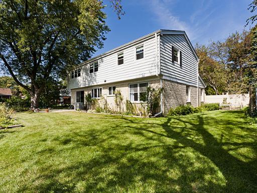 2427 Central Road Glenview, IL 60025 - Photo 14 of 14 a front view of a house with a garden