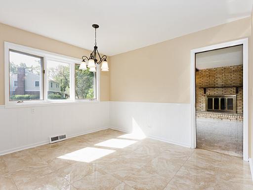 2427 Central Road Glenview, IL 60025 - Photo 5 of 14 a view of a room with large windows