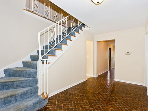2427 Central Road Glenview, IL 60025 - Photo 8 of 14 a view of entryway and hall with wooden floor