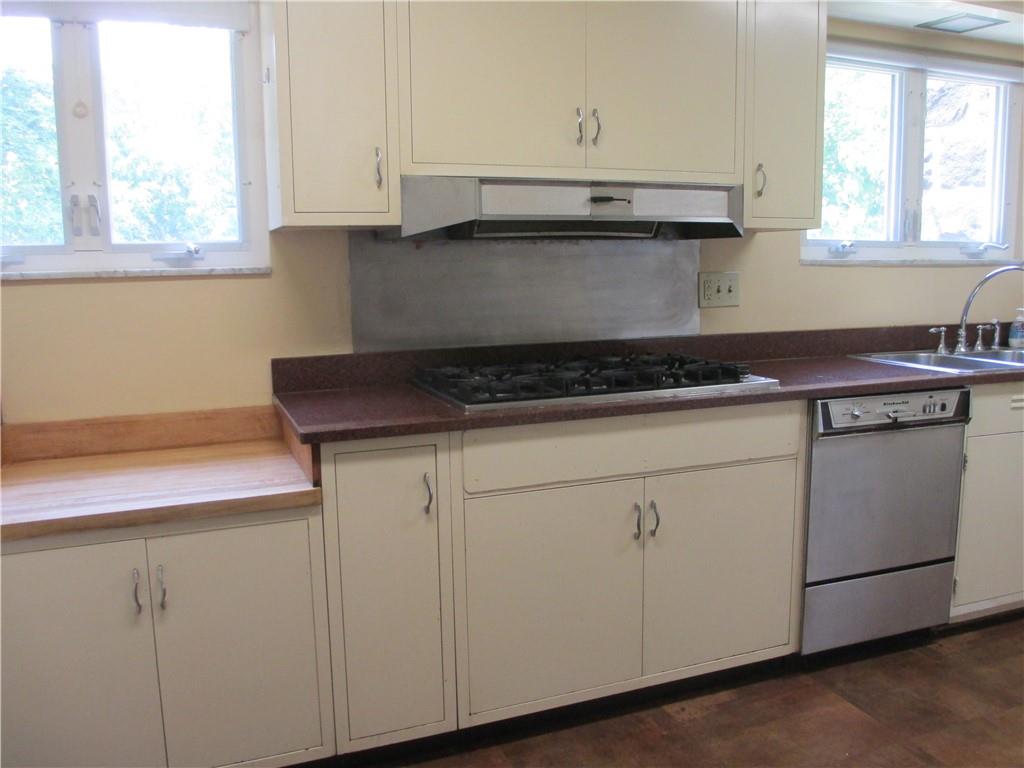 8 Holland Road Pittsburgh, PA 15235 - Photo 11 of 22 a kitchen with granite countertop white cabinets and a sink
