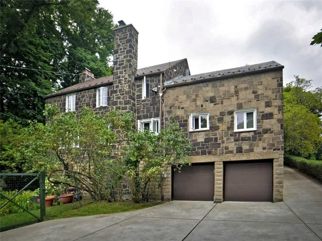 8 Holland Road Pittsburgh, PA 15235 - Photo 2 of 22 front view of a house with a yard