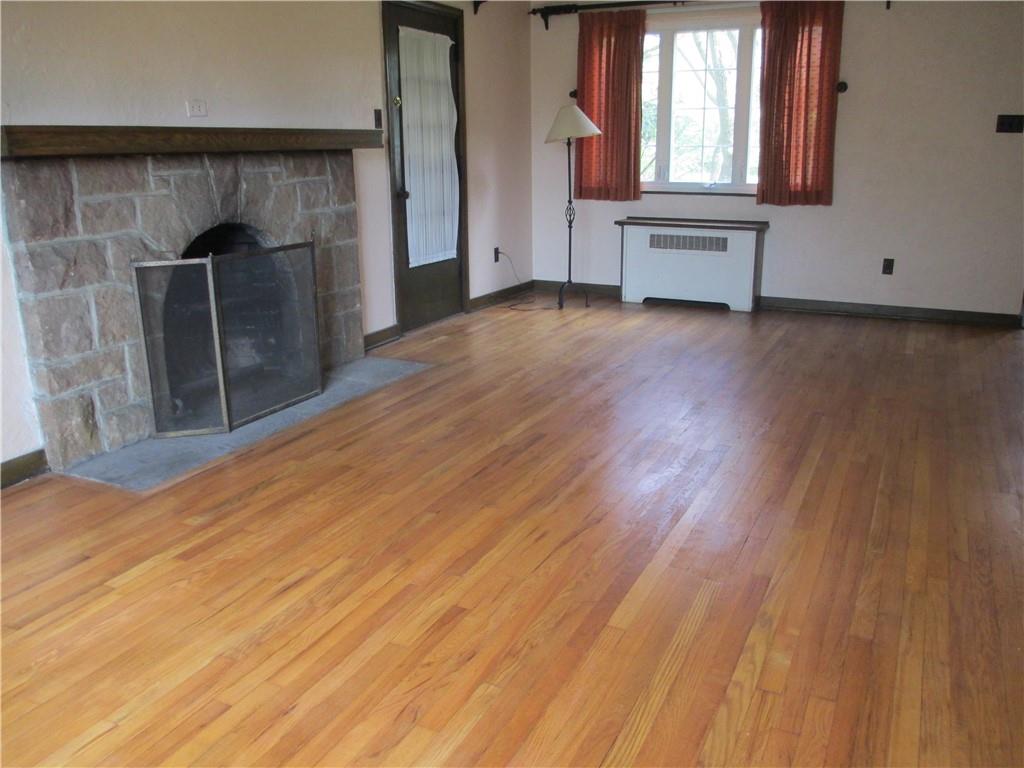8 Holland Road Pittsburgh, PA 15235 - Photo 5 of 22 an empty room with windows