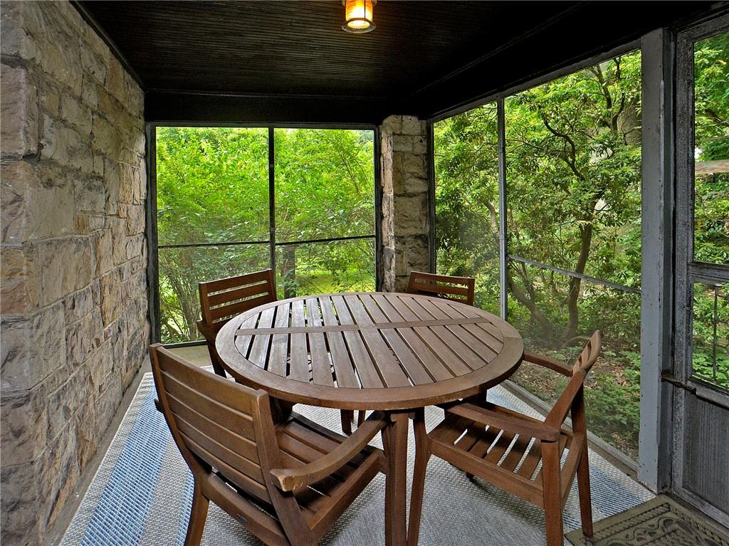 8 Holland Road Pittsburgh, PA 15235 - Photo 7 of 22 a view of a patio with a table chairs and a backyard