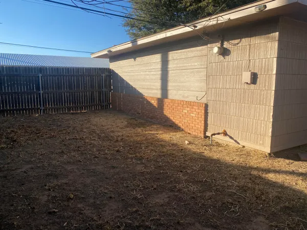 a view of a storage room with empty racks