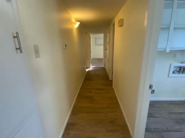 a bathroom with a sink a mirror and a bathtub