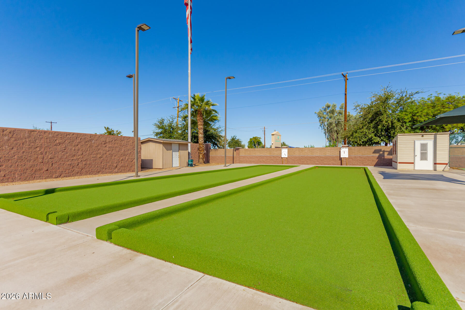 111 South Greenfield Road, Unit 104 Mesa, AZ 85206 - Photo 54 of 74 a view of yard with swimming pool