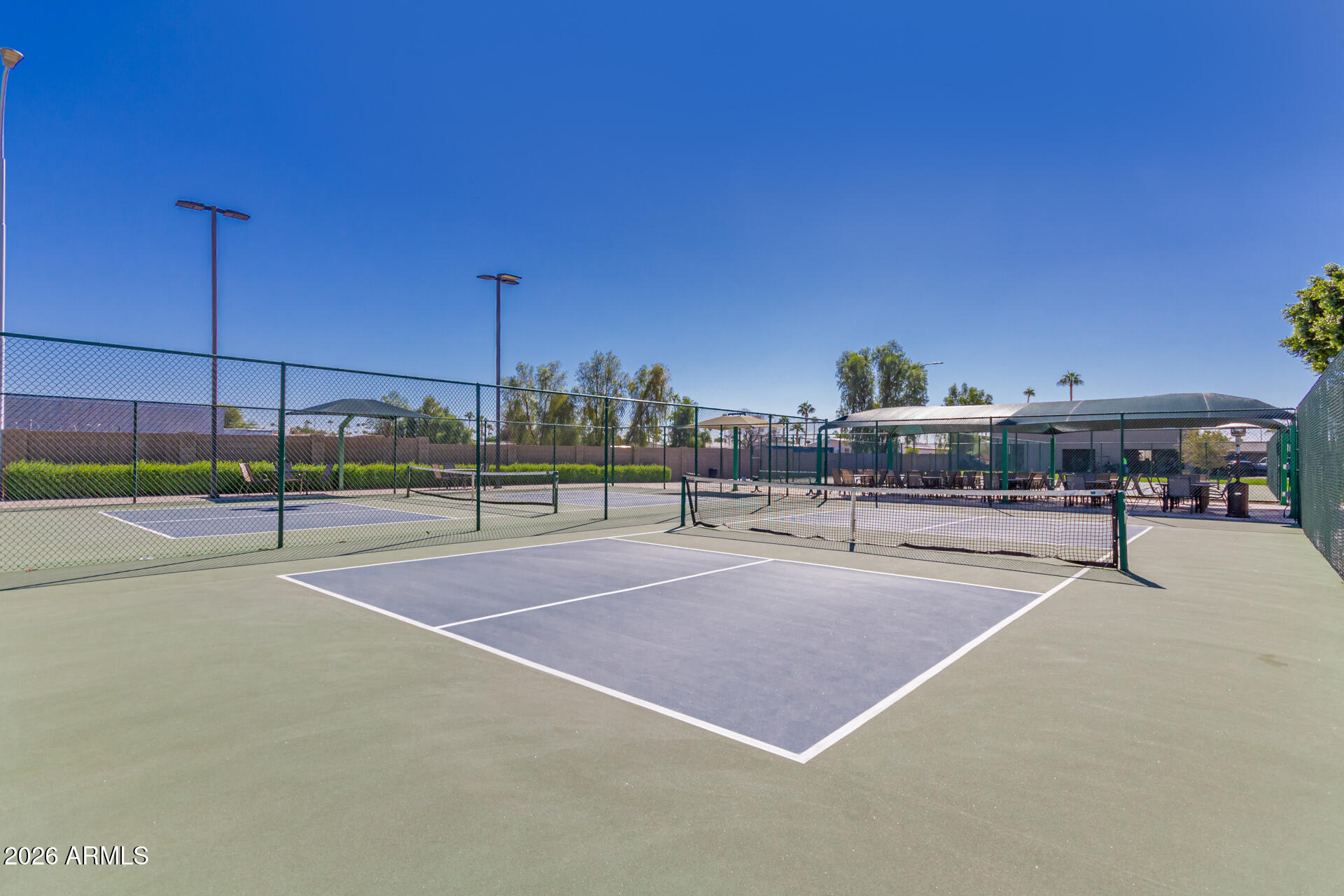 111 South Greenfield Road, Unit 104 Mesa, AZ 85206 - Photo 56 of 74 a view of a tennis court