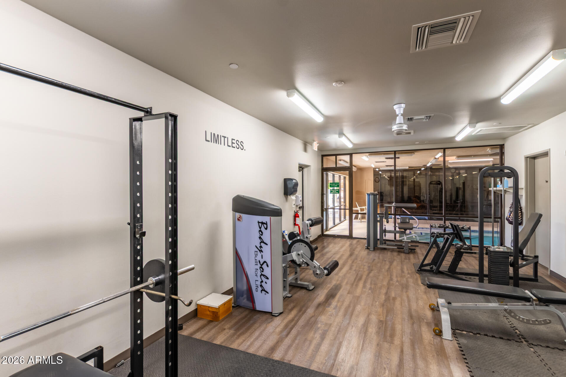 111 South Greenfield Road, Unit 104 Mesa, AZ 85206 - Photo 65 of 74 a view of a room with gym equipment