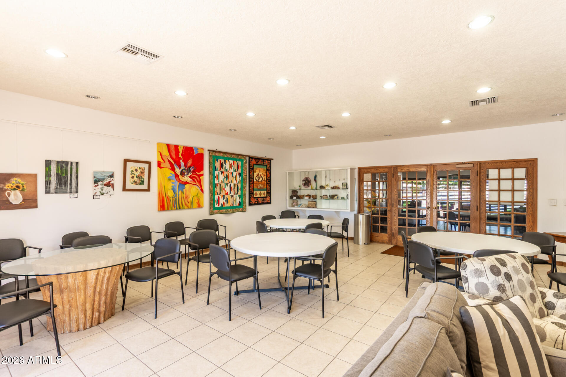 111 South Greenfield Road, Unit 104 Mesa, AZ 85206 - Photo 70 of 74 a view of a dining room with furniture