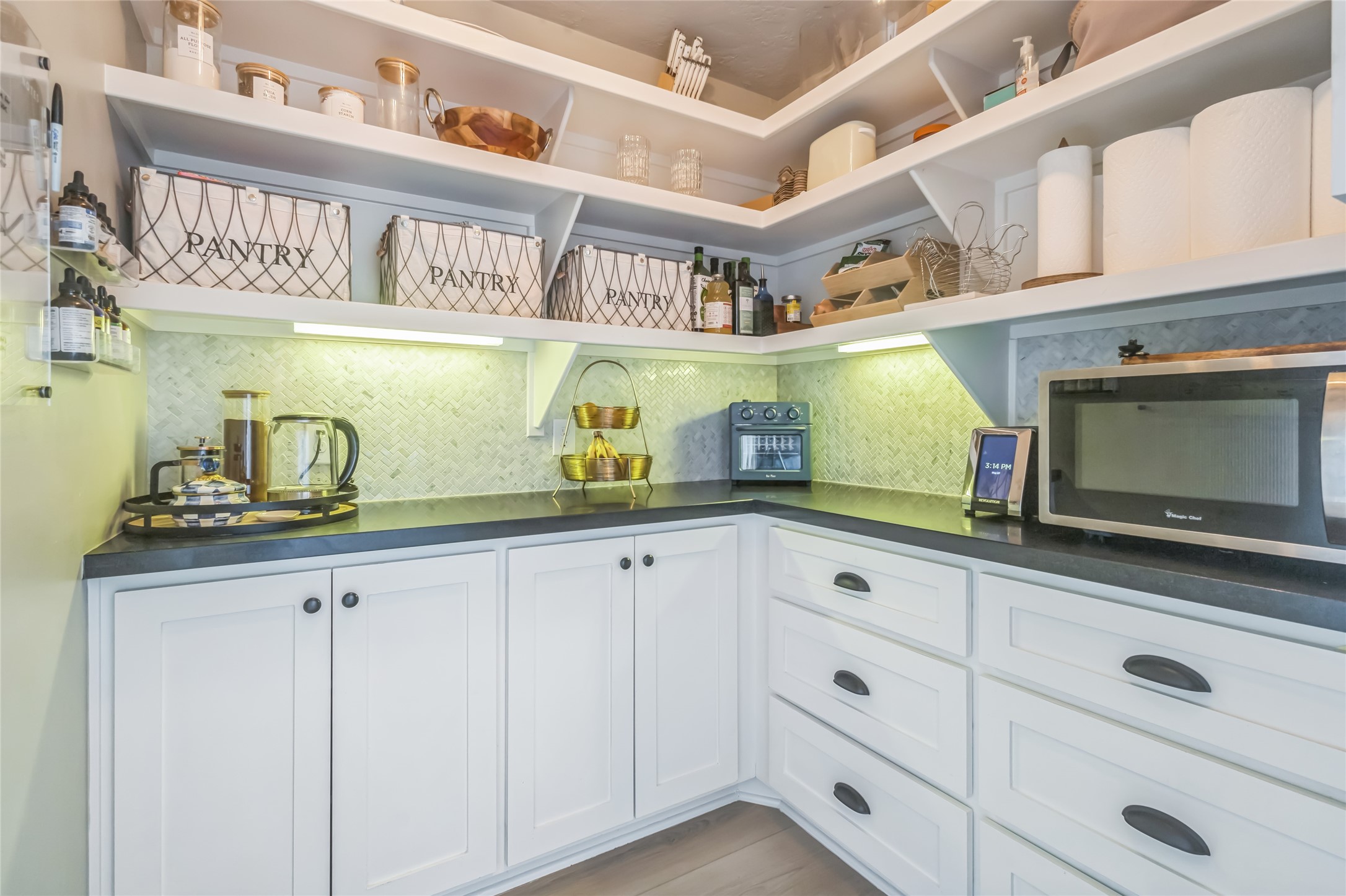 40498 Community Road Magnolia, TX 77354 - Photo 22 of 32 a kitchen with cabinets and window