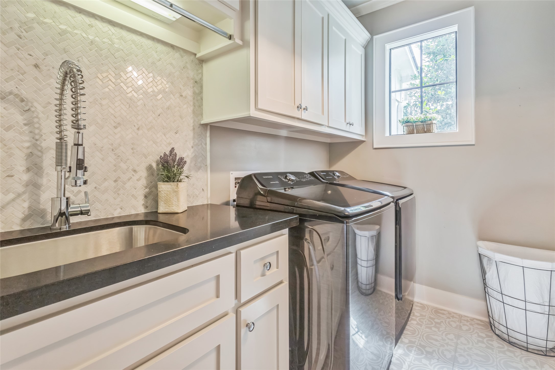 40498 Community Road Magnolia, TX 77354 - Photo 23 of 32 a kitchen with a sink and cabinets