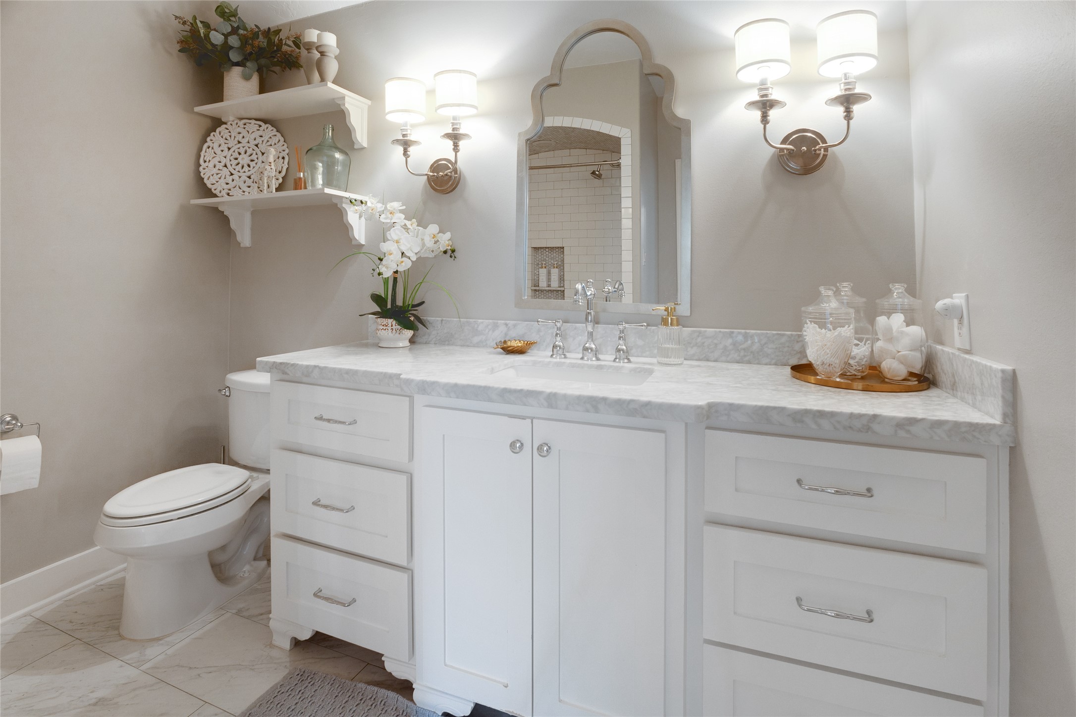40498 Community Road Magnolia, TX 77354 - Photo 24 of 32 a bathroom with a toilet sink and mirror