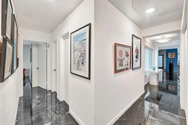 a spacious bedroom with a bed and window