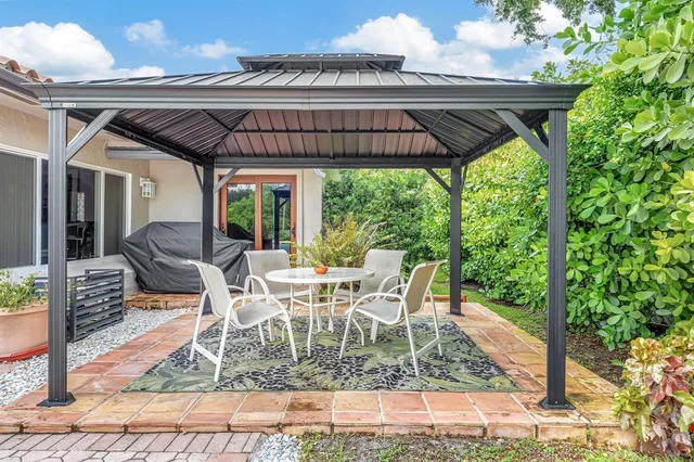 a front view of house with yard and seating