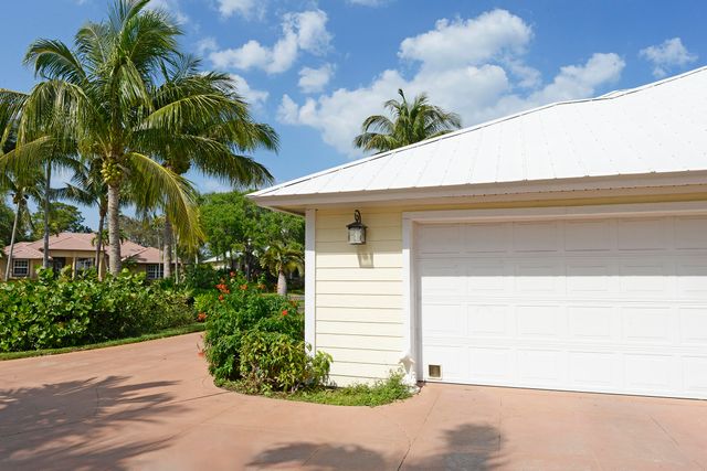 a view of a lake with a large building in the background