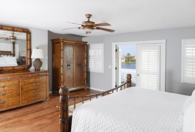 a bedroom with furniture and window