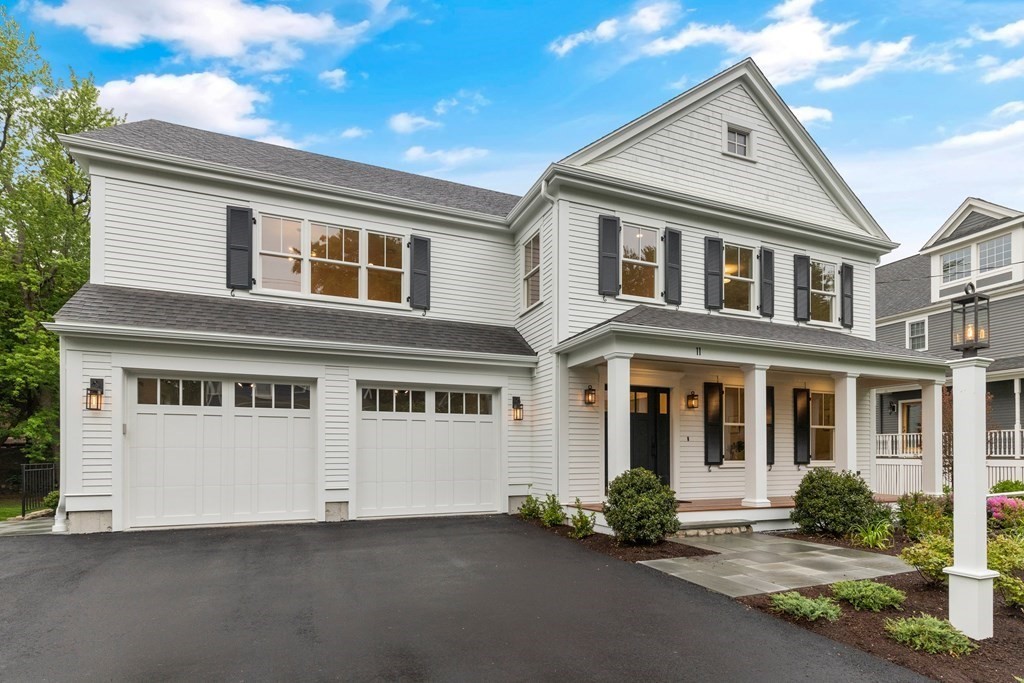 11 Sherman Street Lexington, MA 02420 - Photo 1 of 40 a front view of a house with yard