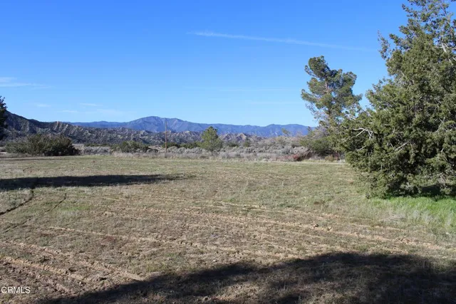 a view of lake with mountain