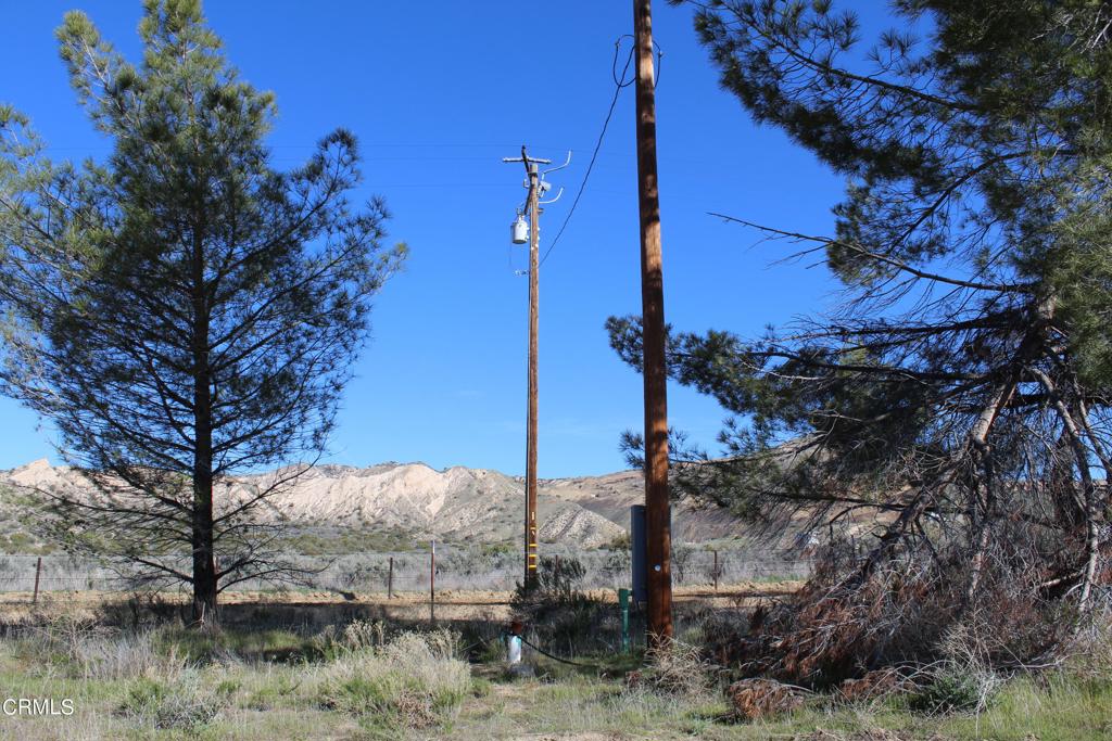 4190 Quatal Canyon Road Maricopa, CA 93252 - Photo 34 of 41 a view of a yard with wooden fence