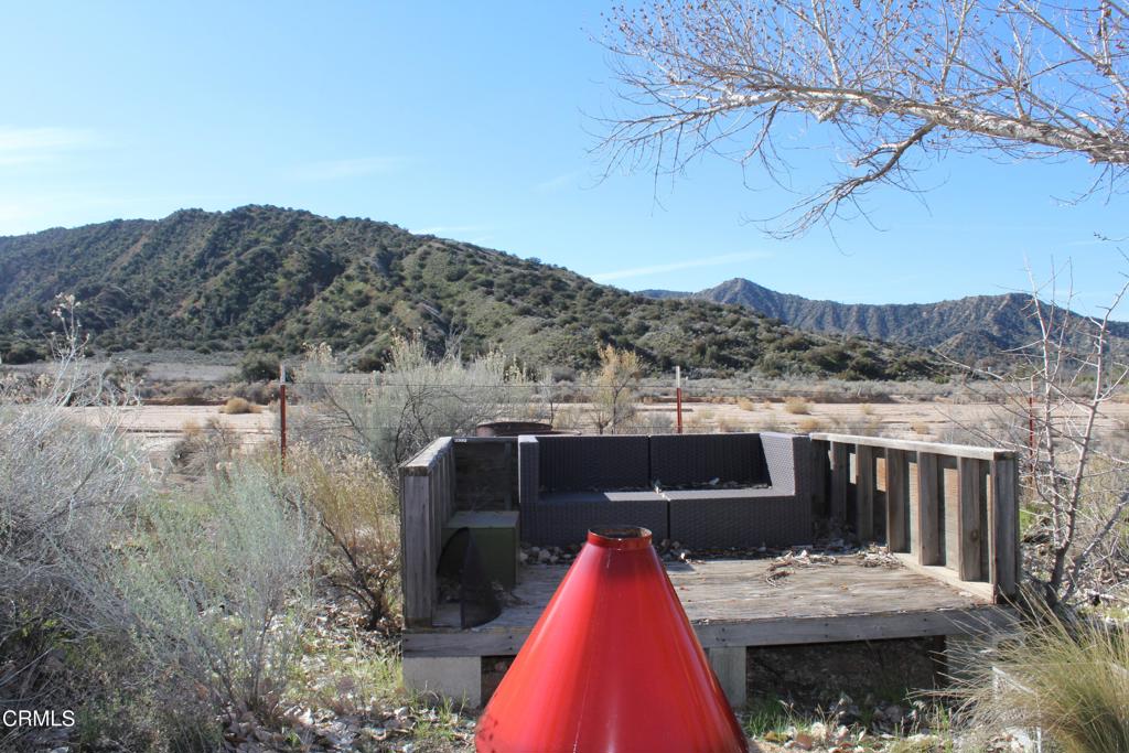 4190 Quatal Canyon Road Maricopa, CA 93252 - Photo 40 of 41 a view of house with a yard and mountain view